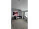 Bedroom with a window, fan, and a flag on the wall at 6842 Arrowhead Dr, Brownsburg, IN 46112