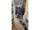 Walk in closet filled with hanging and folded clothing and shoes on shelves at 6842 Arrowhead Dr, Brownsburg, IN 46112