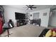 Large game room offers comfortable seating, electric fireplace, and plenty of room to play at 6842 Arrowhead Dr, Brownsburg, IN 46112