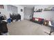 Spacious game room featuring stylish black futon, grey carpet and fun décor at 6842 Arrowhead Dr, Brownsburg, IN 46112