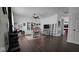 Bright living room featuring wood floors and a ceiling fan at 6842 Arrowhead Dr, Brownsburg, IN 46112