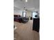 Main bedroom with tray ceiling, bench and desk area at 6842 Arrowhead Dr, Brownsburg, IN 46112