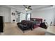 Lovely main bedroom with tray ceiling and a sleek black bench at 6842 Arrowhead Dr, Brownsburg, IN 46112
