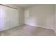 This bedroom has a closet with folding doors, and a single door to another room at 7239 Wet Rock Ct, Indianapolis, IN 46236