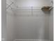 A walk-in closet with a wire shelving rack for organized storage at 7239 Wet Rock Ct, Indianapolis, IN 46236