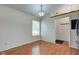 Dining area with hardwood floors is adjacent to the kitchen and features a large window at 7239 Wet Rock Ct, Indianapolis, IN 46236