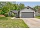Charming single Gathering home featuring a two-car garage, and well-maintained landscaping at 7239 Wet Rock Ct, Indianapolis, IN 46236