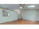Inviting living room with fan, skylight, and seamless access to other living areas at 7239 Wet Rock Ct, Indianapolis, IN 46236