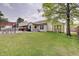 Expansive backyard with a pool, patio, and storage shed at 7372 Oakview Dr, Avon, IN 46123