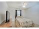 Modest bedroom featuring a single bed and dresser with TV at 7372 Oakview Dr, Avon, IN 46123
