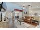Spacious living room with an open layout, seamlessly connecting to the dining room and kitchen at 7372 Oakview Dr, Avon, IN 46123