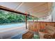 Inviting covered patio area overlooking a refreshing in-ground pool at 7372 Oakview Dr, Avon, IN 46123