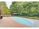 Beautifully maintained in-ground pool with lush green surroundings at 7372 Oakview Dr, Avon, IN 46123