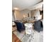 Comfortable living room area with a fireplace, modern seating, and stylish decor at 7470 Charrington Ct, Indianapolis, IN 46254