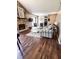 Inviting living room with dark hardwood floors, fireplace, and comfortable seating at 7470 Charrington Ct, Indianapolis, IN 46254