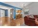 Eat-in kitchen with breakfast bar, stainless appliances, and great natural light at 7616 Derrek Pl, Indianapolis, IN 46219