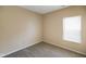 Standard bedroom with neutral paint and carpet and a window with blinds at 7715 Bolero Dr, Camby, IN 46113