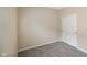 Neutral bedroom featuring a closet with sliding doors and neutral carpet at 7715 Bolero Dr, Camby, IN 46113