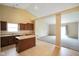 Open kitchen layout featuring a center island bar and open access to the living area at 7715 Bolero Dr, Camby, IN 46113