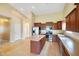 The spacious kitchen features stainless steel appliances and a large center island at 7715 Bolero Dr, Camby, IN 46113
