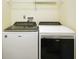 This home includes a side-by-side washer and dryer and overhead shelving at 7715 Bolero Dr, Camby, IN 46113