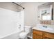 Bathroom with a combined shower and tub, toilet, and wooden vanity at 779 Alvey Ct, Greenwood, IN 46143