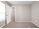 This bedroom features carpeted floors, neutral walls and a closet at 779 Alvey Ct, Greenwood, IN 46143