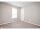 This is a bedroom with carpeted floors, neutral walls, and a window at 779 Alvey Ct, Greenwood, IN 46143