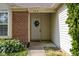 Inviting front entrance with a wreath and address number above the door at 779 Alvey Ct, Greenwood, IN 46143