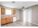 Kitchen features wood cabinets, neutral countertop and white appliances at 779 Alvey Ct, Greenwood, IN 46143