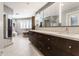 Luxury bathroom featuring a double vanity, glass shower, and modern fixtures at 8651 Emerald Ln, Indianapolis, IN 46260