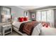 Cozy bedroom featuring carpet, a large bed, and a large window with curtains at 8651 Emerald Ln, Indianapolis, IN 46260