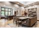 Elegant dining room boasts a beautiful table setting and stylish decor, perfect for entertaining at 8651 Emerald Ln, Indianapolis, IN 46260