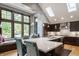 Bright and airy kitchen with marble countertops, stainless steel appliances, and a large window overlooking the yard at 8651 Emerald Ln, Indianapolis, IN 46260