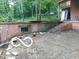 Shows a concrete foundation and staircase next to the side of the home at 8803 S Sleepy Hollow Rd, Waldron, IN 46182