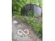 A grey shed surrounded by some weeds at 8803 S Sleepy Hollow Rd, Waldron, IN 46182