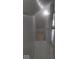 Hallway features a white staircase, providing a clean and functional transition between floors at 9024 W Mooresville Rd, Indianapolis, IN 46113