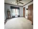 Bright bedroom featuring natural light, a ceiling fan, and classic wood accents at 907 Corey Ln, Plainfield, IN 46168