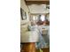 Bright living room with comfortable sofa, ottoman, hardwood floors, and stylish decor at 907 Corey Ln, Plainfield, IN 46168