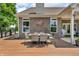 Outdoor deck featuring a dining area, perfect for entertaining, and access to the backyard at 9231 E Poynter Dr, Morgantown, IN 46160