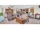 Open living room flows to kitchen and dining area, perfect for entertaining and everyday living at 9231 E Poynter Dr, Morgantown, IN 46160