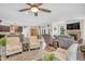 Open concept living space with neutral tones and decor, connecting to kitchen and dining areas at 9231 E Poynter Dr, Morgantown, IN 46160