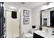 Modern bathroom with a glass-enclosed shower and vanity at 9508 Oakley Dr, Indianapolis, IN 46260