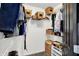 Well-organized walk-in closet with white shelving and wicker baskets for storage at 9508 Oakley Dr, Indianapolis, IN 46260