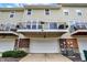 Townhome features a garage and upper level deck at 9508 Oakley Dr, Indianapolis, IN 46260