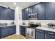 Modern kitchen features stainless steel appliances and sleek countertops for a stylish cooking space at 9508 Oakley Dr, Indianapolis, IN 46260