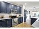 Modern kitchen featuring stainless steel appliances and plenty of cabinet space with a great view at 9508 Oakley Dr, Indianapolis, IN 46260