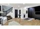 Open-concept room featuring access to a bathroom and staircase to the second floor at 9508 Oakley Dr, Indianapolis, IN 46260