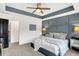 Relaxing main bedroom featuring stylish wall trim and plenty of space for furniture at 9508 Oakley Dr, Indianapolis, IN 46260
