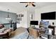 Upstairs home office with desk and natural light at 9508 Oakley Dr, Indianapolis, IN 46260